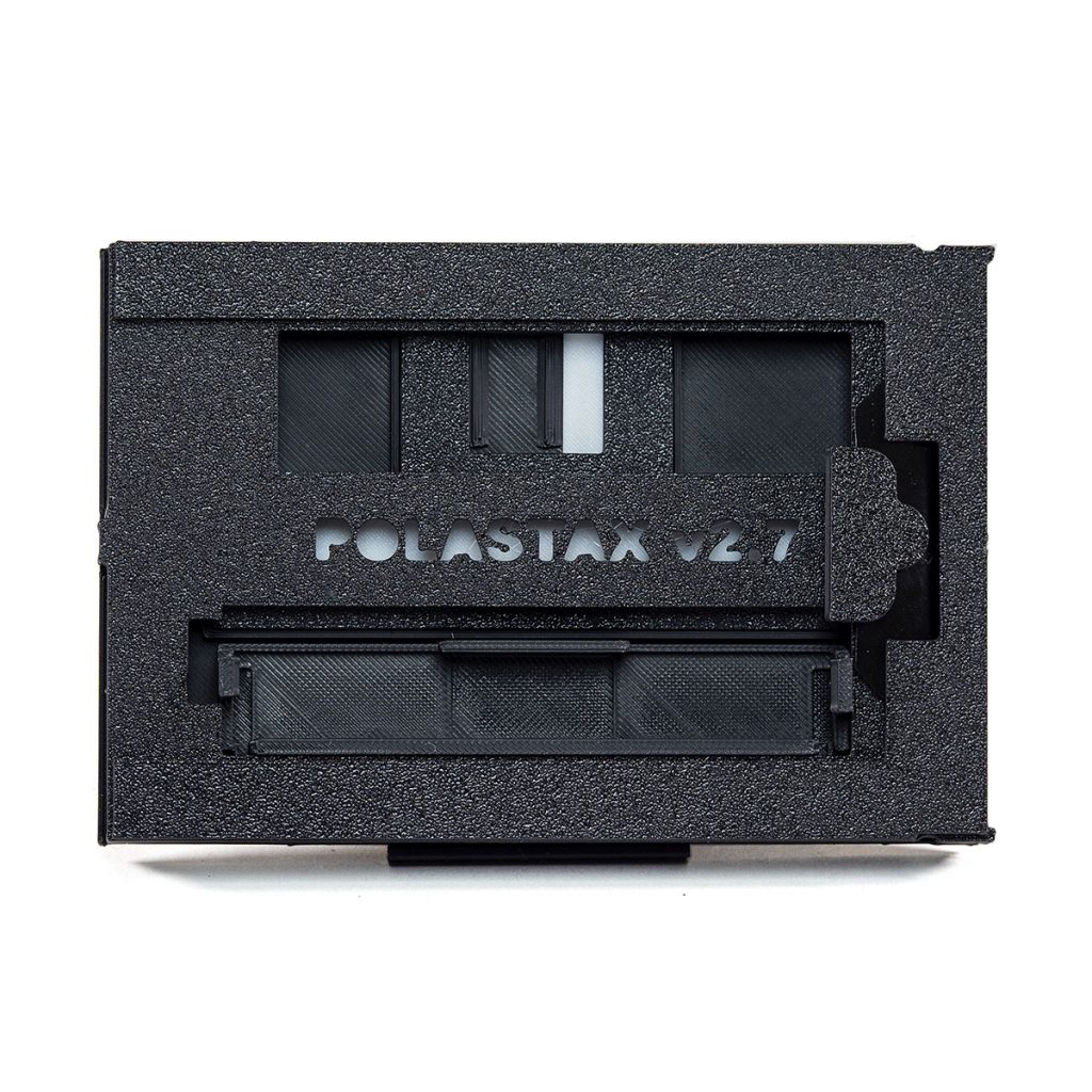 The Polastax Instax Wide Film Holder lets you Use Instax Wide instant film in a Polaroid pack film camera.