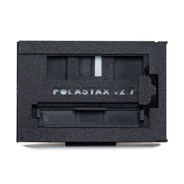 The Polastax Instax Wide Film Holder lets you Use Instax Wide instant film in a Polaroid pack film camera.