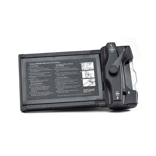 Polaroid 545i film developer with 4x5 dark slide for Instax Wide developing.