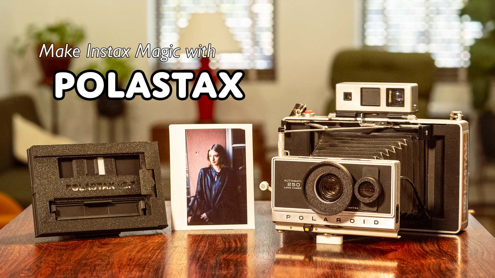 Polastax Instax Wide Film Holder, sample Instax Wide print, and refurbished Polaroid 250 Land Camera.