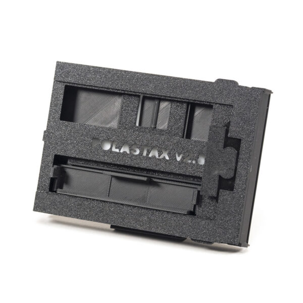 The Polastax Instax Wide Film Holder lets you Use Instax Wide instant film in a Polaroid pack film camera.